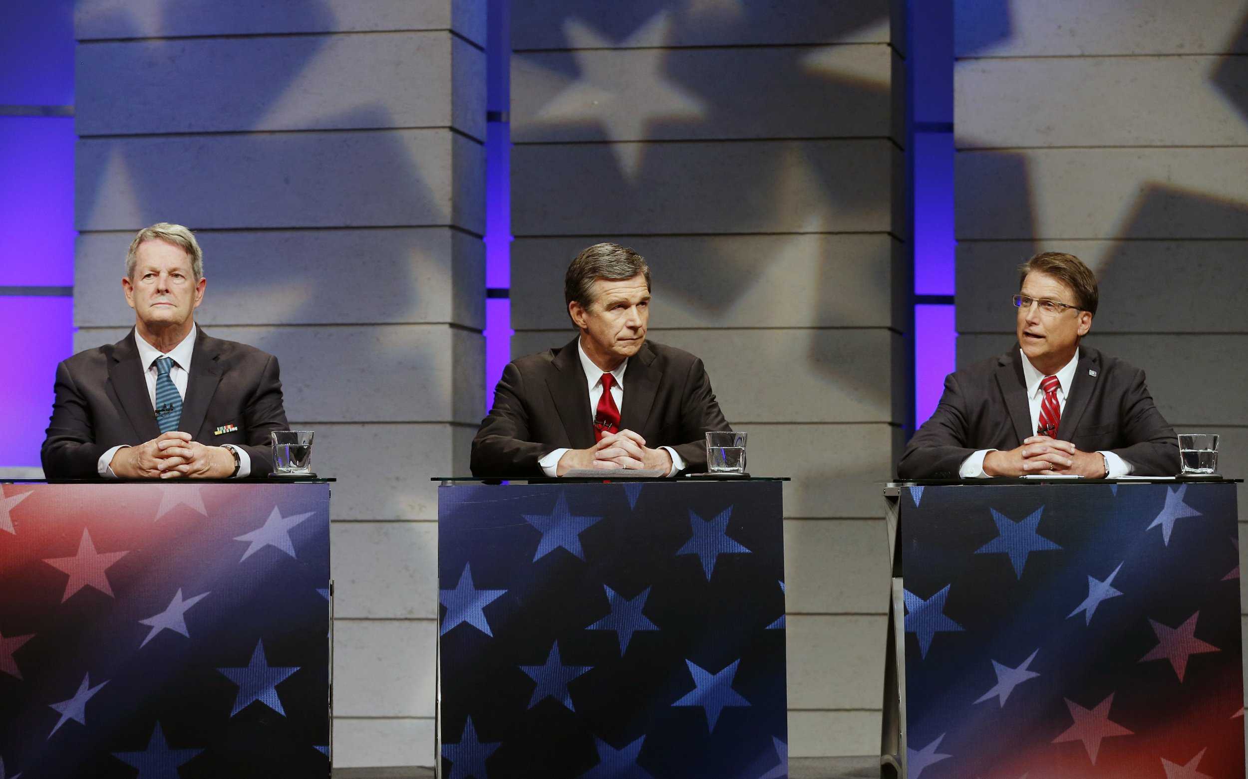 Candidates for Governor of North Carolina, from left, Libertarian Lon Cecil, Democrat Roy Cooper, and Republican Gov. Pat McCrory debate at WRAL studios in Raleigh, N.C., on Tuesday, Oct. 18, 2016. (Chris Seward/Charlotte Observer/TNS)