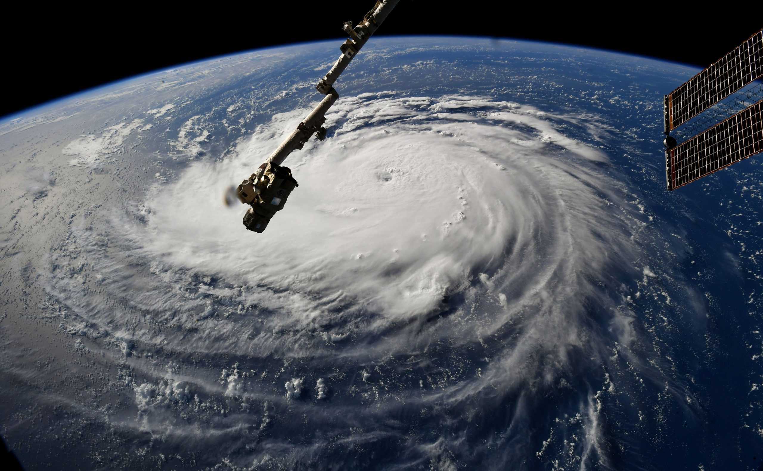 This photo from space shows Hurricane Florence from the International Space Station on Sept. 10, 2018, as it threatens the U.S. East Coast. Airlines are encouraging customers whose plans could be affected by the storm to reschedule travel. (NASA)