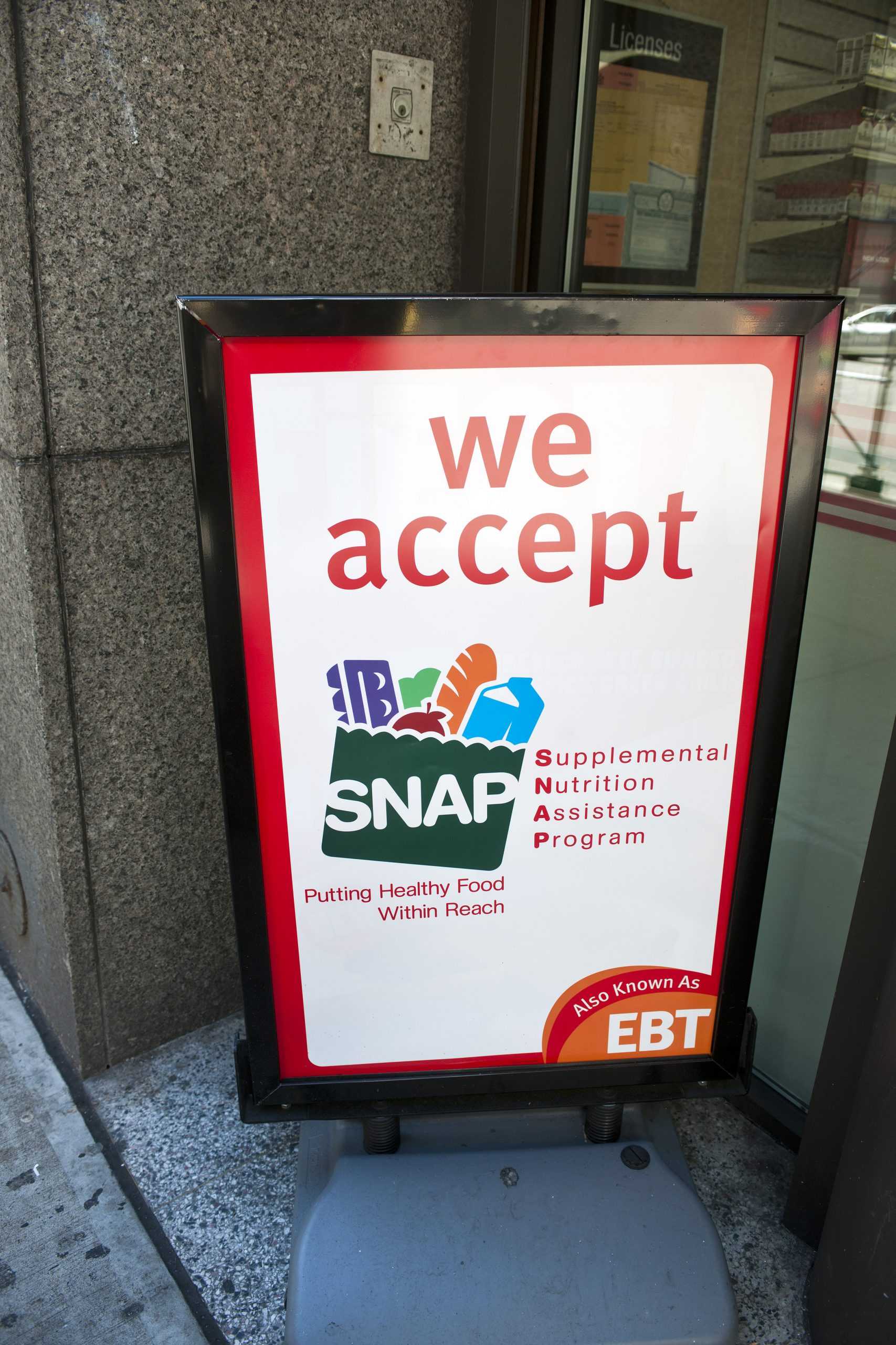 A sign in front of a 7-Eleven in New York announces that the convenience store accepts SNAP (Supplemental Nutrition Assistance Program), on October 20, 2012. President Donald Trump has called for replacing half of the food stamp benefits received with a food delivery service tentatively called Americas Harvest Box. (Richard B. Levine/Sipa USA/TNS)