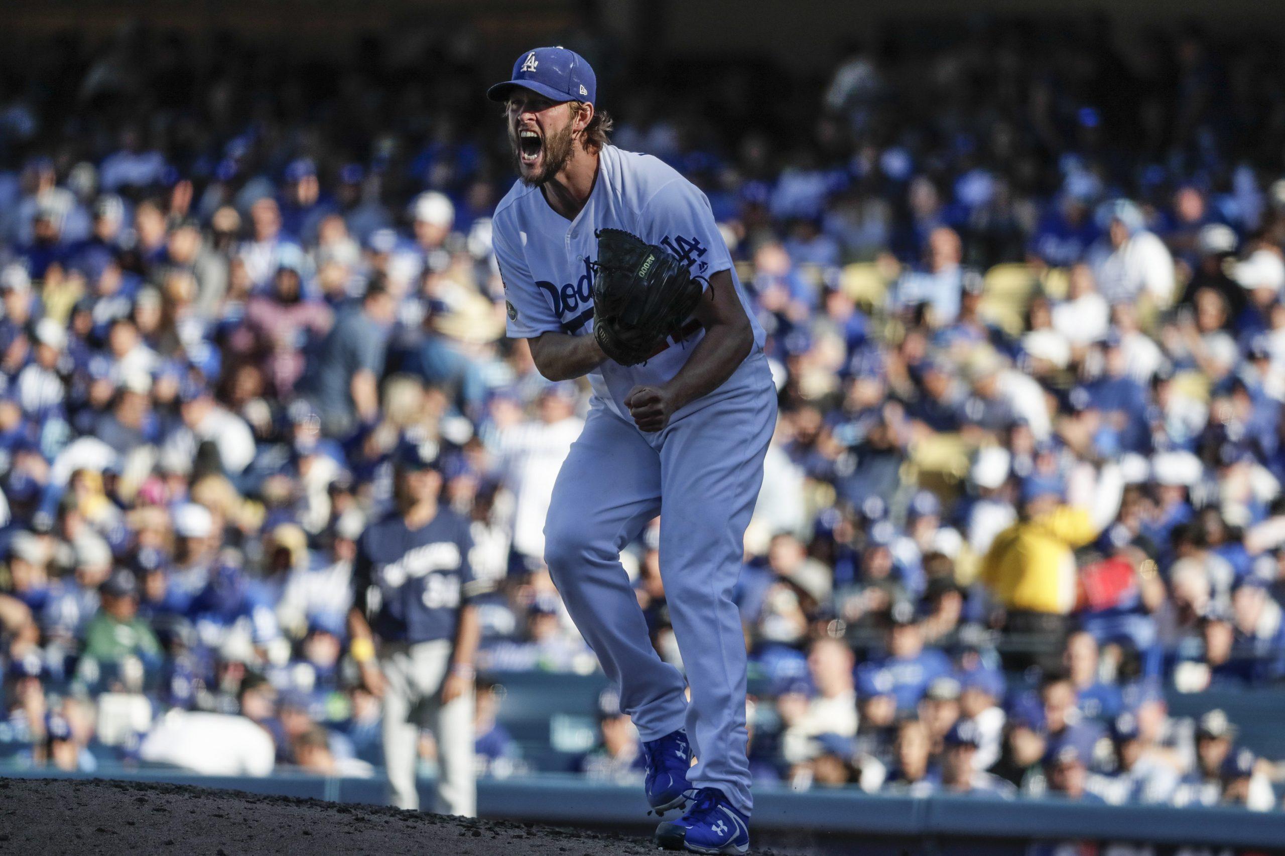 Los Angeles Dodgers pitcher Clayton Kershaw lets his emotion show while pitching against the Milwaukee Brewers in the sixth inning during Game 5 of the National League Championship Series at Dodger Stadium in Los Angeles on Wednesday, Oct. 17, 2018. The Dodgers won, 5-2, for a 3-2 series lead. (Robert Gauthier/Los Angeles Times/TNS)