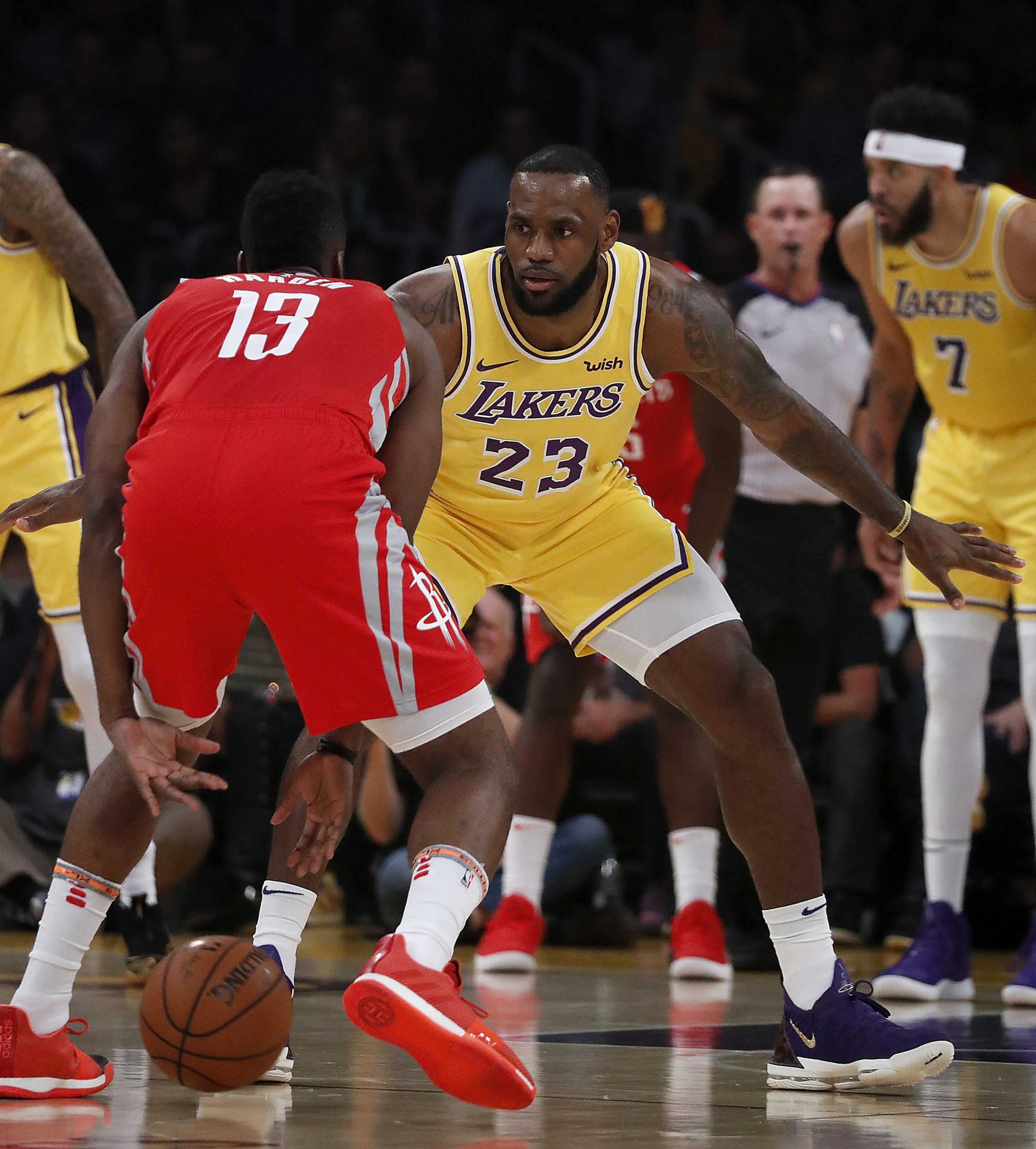 The Los Angeles Lakers LeBron James (23) defends against the Houston Rockets James Harden (13) in the first quarter on Saturday, Oct. 20, 2018, at Staples Center in Los Angeles. (Luis Sinco/Los Angeles Times/TNS)