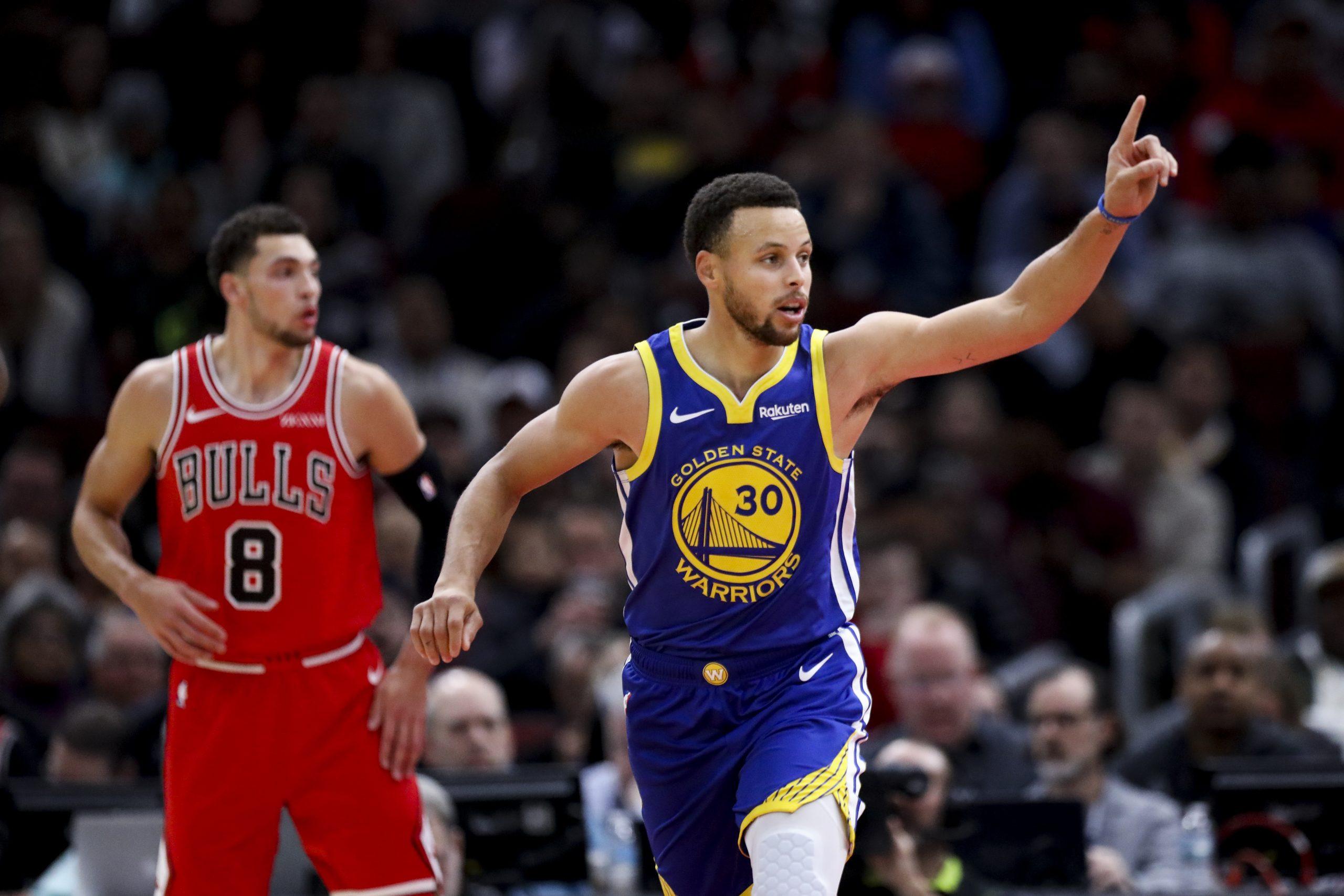 Golden State Warriors guard Stephen Curry (30) puts his finger up after making a shot during the first half against the Chicago Bulls at the United Center Monday Oct. 29, 2018, in Chicago. (Armando L. Sanchez/Chicago Tribune/TNS)