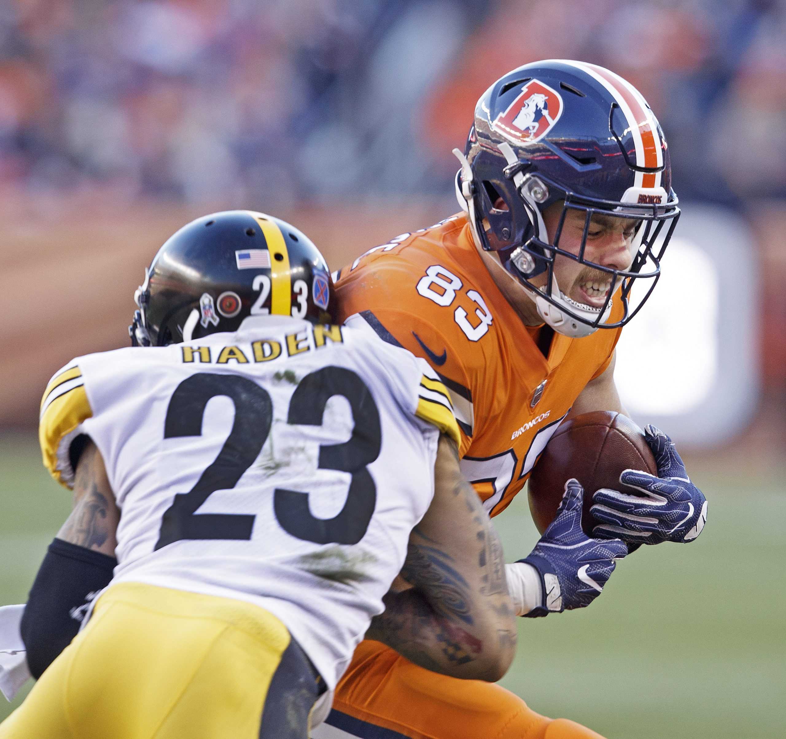 Broncos TE Matt LaCosse, right, catches a pass with Steelers CB Joe Haden, left, during the 2nd half at Broncos Stadium at Mile High Sunday afternoon. (Hector Acevedo/ZUMA Wire/TNS)