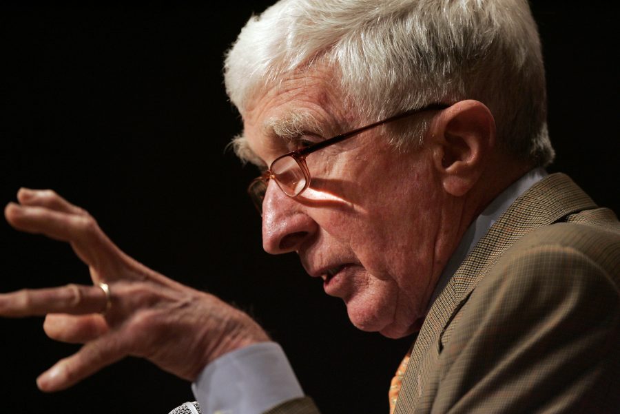 In this June 6, 2007 file photograph, John Updike speaks to a gathering at the Free Library of Philadelphia and reads from his book The Terrorist. His main goal as a literary journalist is to describe and explain the work before us, and account for its impact and in a marvelous prose style. (Michael Bryant/Philadelphia Inquirer/MCT)
