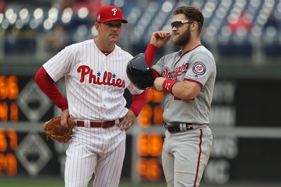 Rhys Hoskins, left, and Bryce Harper are both represented by agent Scott Boras.