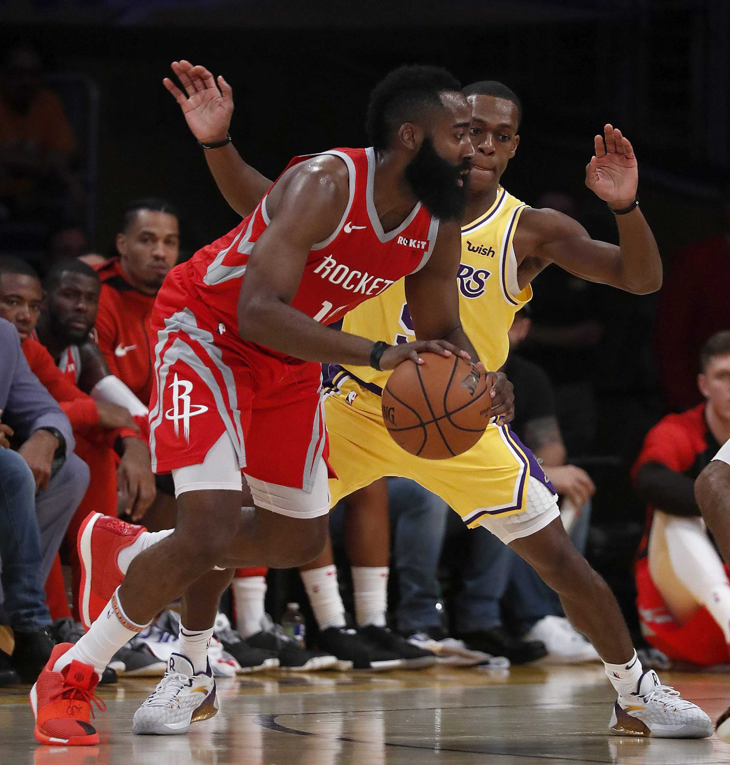 The Los Angeles Lakers Rajon Rondo defends against the Houson Rockets James Harden in the first quarter on Saturday, Oct. 20, 2018, at Staples Center in Los Angeles. (Luis Sinco/Los Angeles Times/TNS)