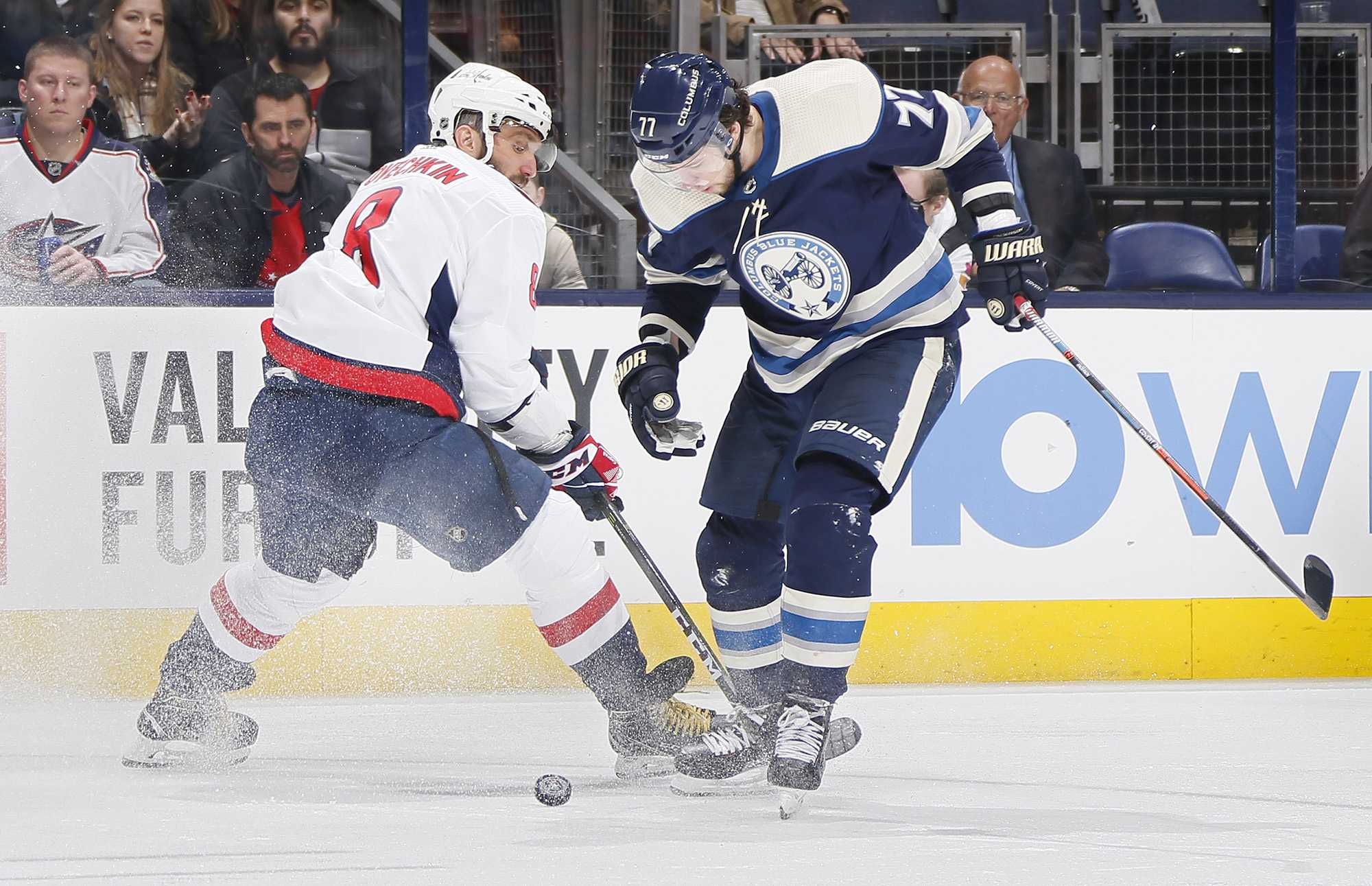 Columbus Blue Jackets right wing Josh Anderson (77) skates around Washington Capitals left wing Alex Ovechkin (8) during the third period on Tuesday, Feb. 12, 2019 of at Nationwide Arena in Columbus, Ohio. (Adam Cairns/Columbus Dispatch/TNS)