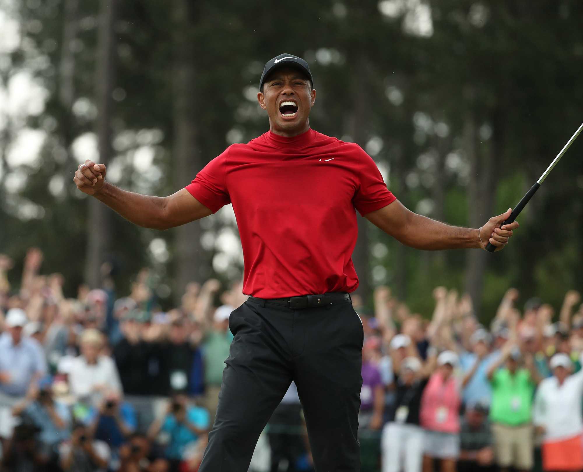 Tiger Woods celebrates after winning the Masters during the final round on Sunday, April 14, 2019, at Augusta National Golf Club in Augusta, Ga. (Jason Getz/Atlanta Journal-Constitution/TNS)