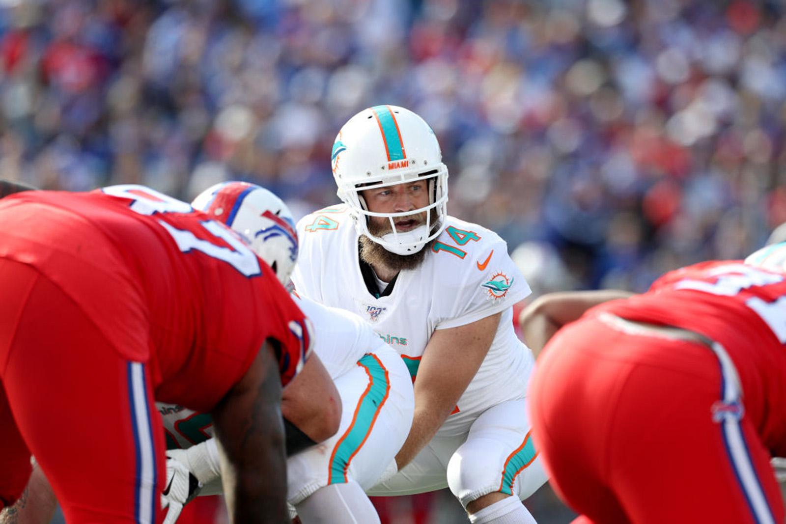 Ryan Fitzpatrick #14 of the Miami Dolphins looks to his left during the third quarter of an NFL game against the Buffalo Bills at New Era Field on October 20, 2019 in Orchard Park, New York. (Bryan M. Bennett/Getty Images/TNS)