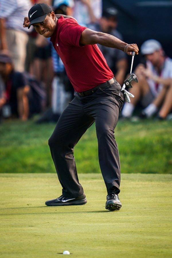 Photographer Hunter Dyke won first place for best sports feature photograph for “Tiger feels the heat” — golfer Tiger Woods competing at the PGA Championship in St. Louis — and second place for best sports photograph for “18th hole heroics.” [Hunter Dyke/Tribune]