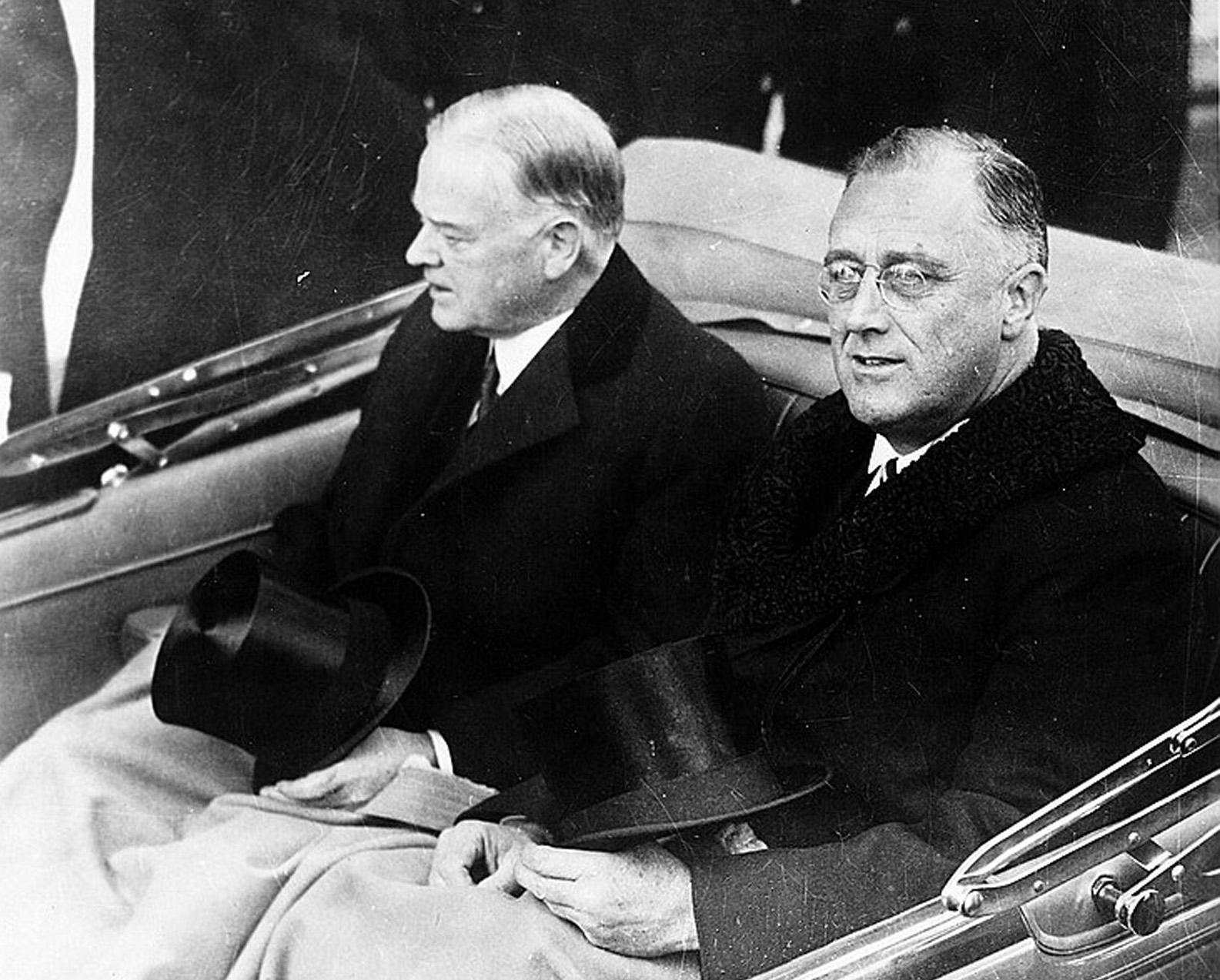 President-elect Franklin Delano Roosevelt, right, and President Herbert Hoover ride in convertible automobile on its way to the U.S. Capitol for Roosevelts inauguration in Washington, D.C., March 4, 1933. (Architect of the Capitol/Library of Congress/MCT)