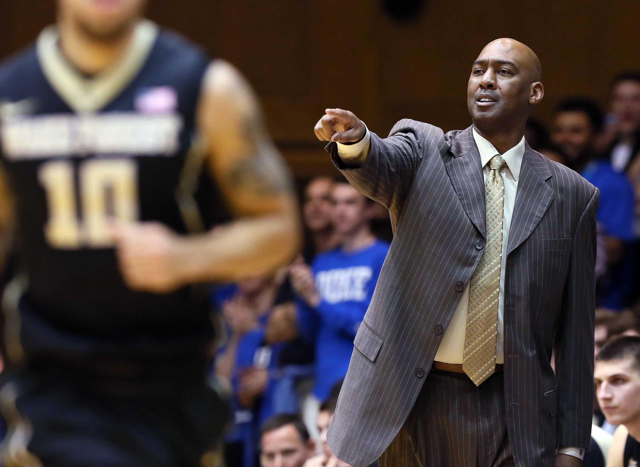 Mar 1, 2016; Durham, NC, USA; Wake Forest Demon Deacons head coach Danny Manning gives instructions to his players in their game against the Duke Blue Devils at Cameron Indoor Stadium. Mandatory Credit: Mark Dolejs-USA TODAY Sports