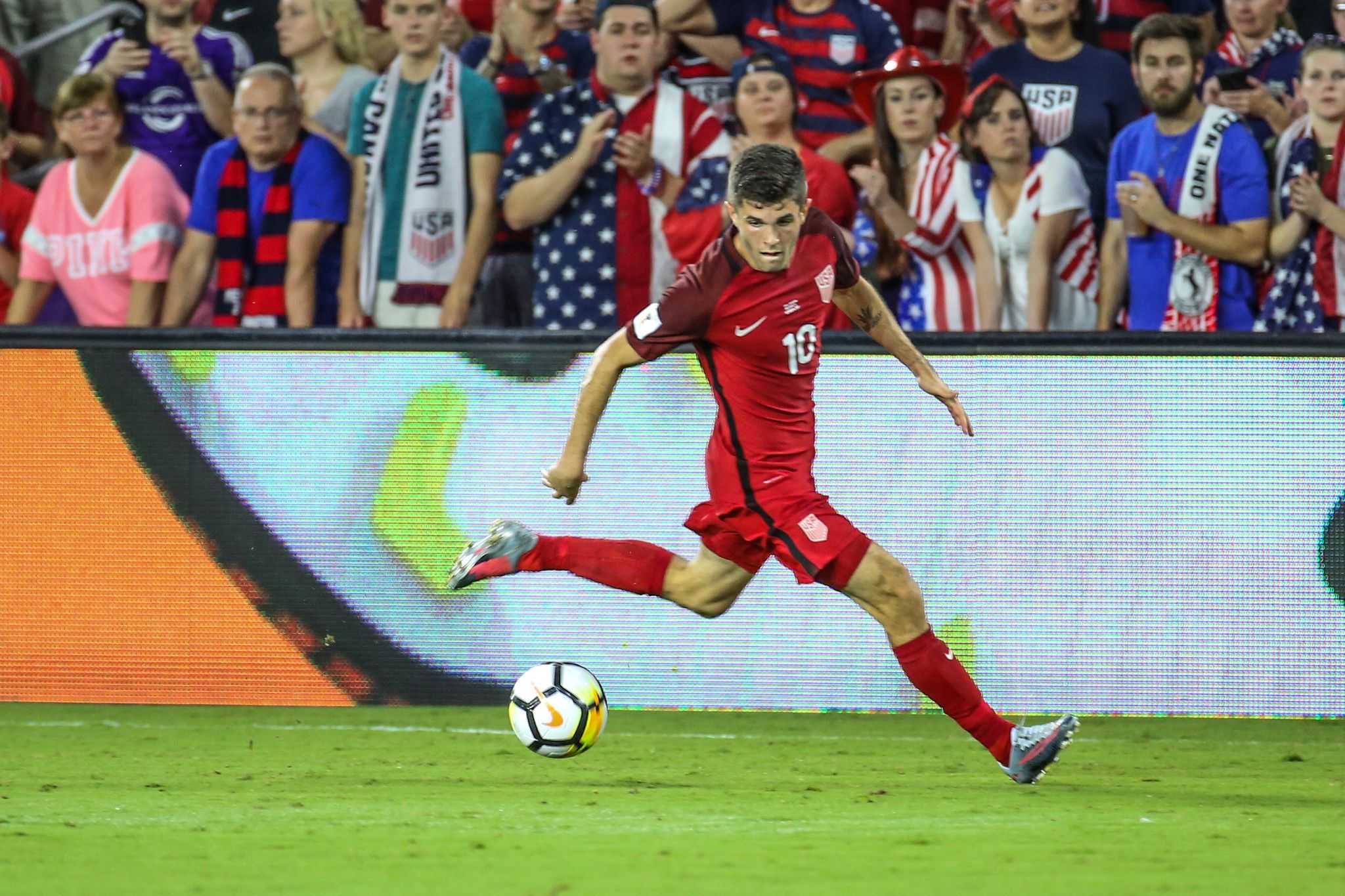 U.S. mens national team star Christian Pulisic (10) keeps his on the eye ball during a match at Exploria Stadium in 2018.