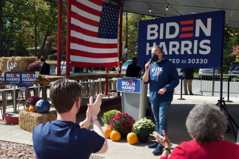 Doug Emhoff, husband of vice-presidential candidate Kamala  Harris, addresses supporters of the campaign at Campus Gas on Monday. The event was conducted entirely in accordance with COVID-19 guidelines (Elizabeth Maline/Old Gold & Black)