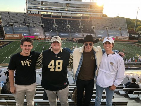 The four friends at the Wake Forest v. UVA football game last month. All that’s left of the magical interaction is a hat and a missed connection (Essex Thayer/Old Gold & Black)