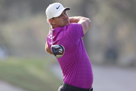 Brooks Koepka emerges to win the Waste Management Open