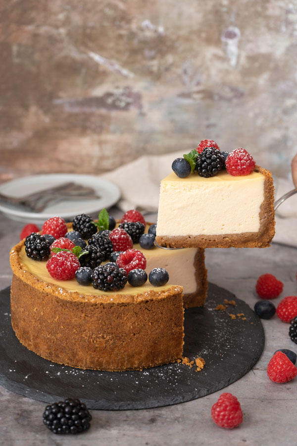 Cheesecake is best served after being heated up for a small amount of time to the point where it is warm, soft and gooey.