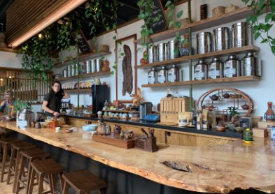 Pictured is the tea bar in High Climate Tea. The bar, which features a wall of teas provides an unforgettable experience for tea lovers.