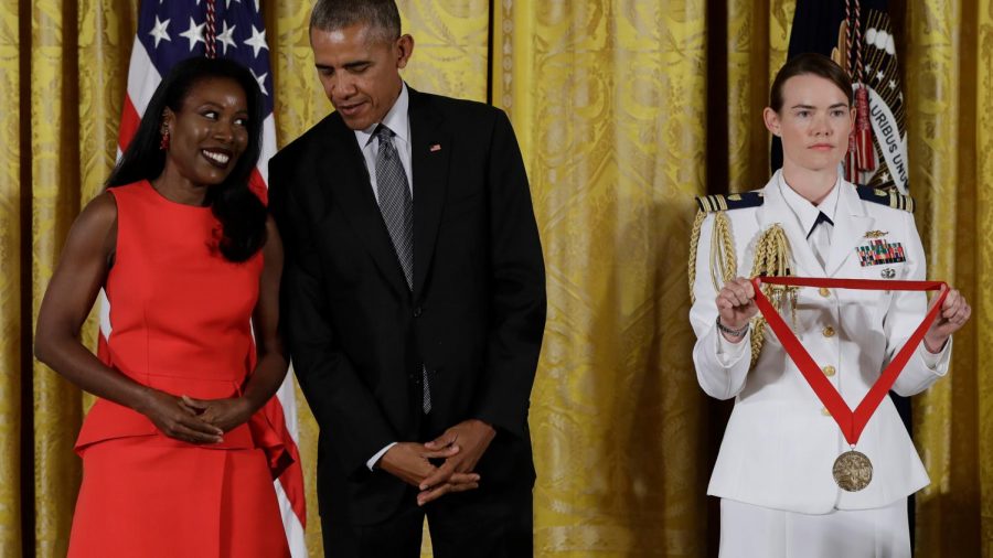 Isabel Wilkerson has won many awards for her writing, including the National Humanities Medal (award ceremony pictured above), which she received from then-President Barack Obama.