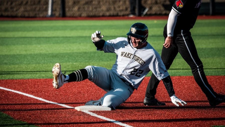 Junior outfielder Michael Ludowig sliding into third base. He hit a home run against Appalachian State on March 30. 