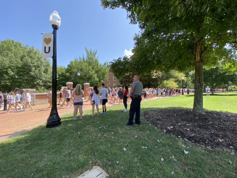 Protesters walk to the quad to continue the protest.