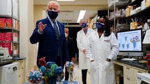 President Joe Biden visits National Institute of Healths (NIH) vaccine research center to learn about the development of the Moderna and Pfizer vaccines.