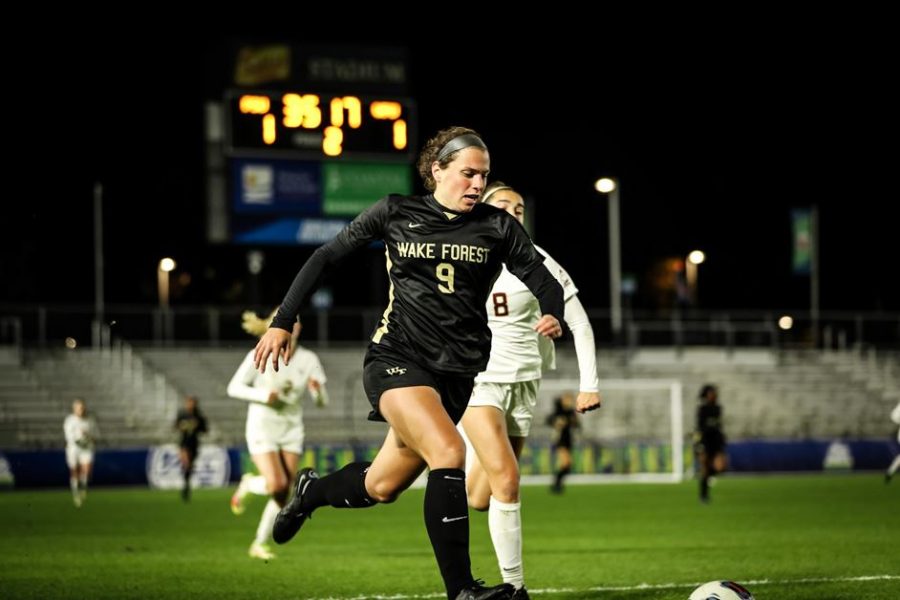 Graduate forward Jenna Menta dribbles down the field with the ball. She scored Wake Forest’s sole goal of the game in the 31st minute.