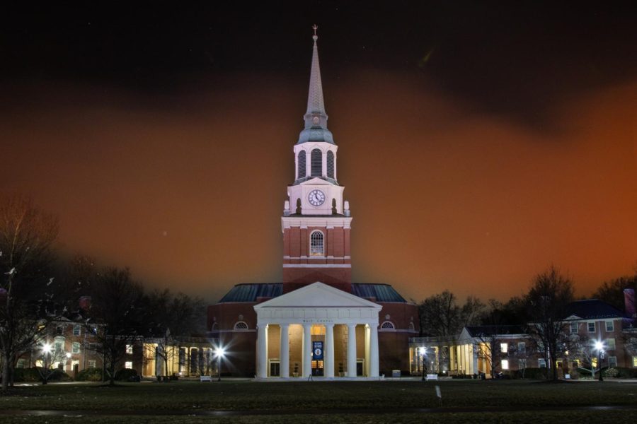 Smoke from the fire forms in a haze over Wait Chapel.
