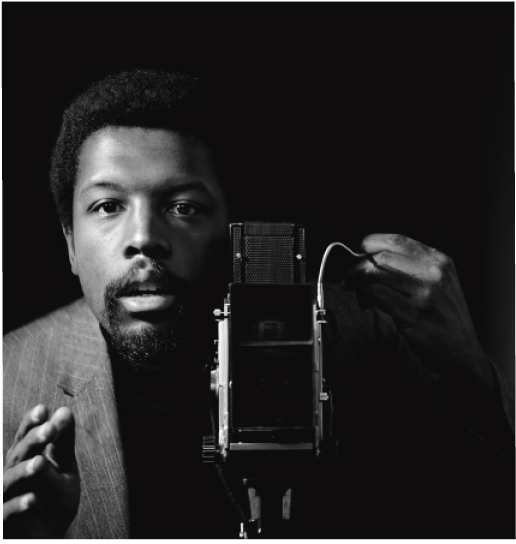 A self-portrait of Kwame Brathwaite taken in Harlem.