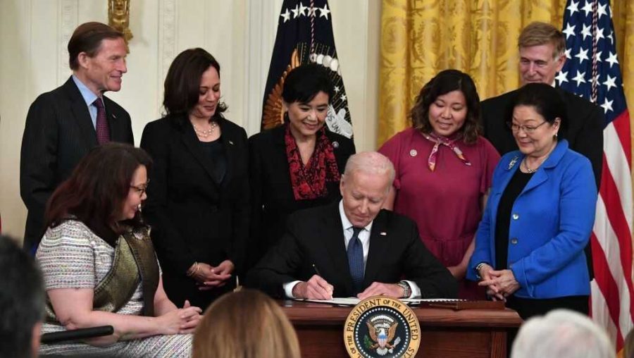 President Joe Biden signs the COVID-19 Hate Crimes Act into law.