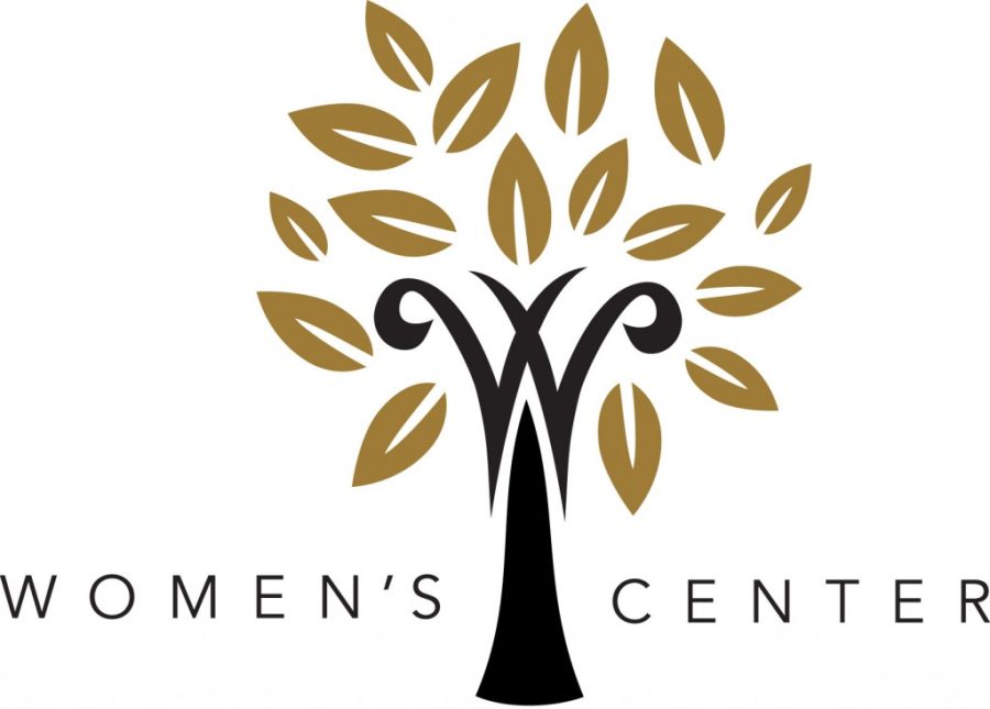 The Womens Center logo, which features a tree with golden leaves.