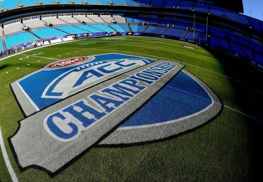 A photograph of the ACC Championship logo on the field at Charlotte