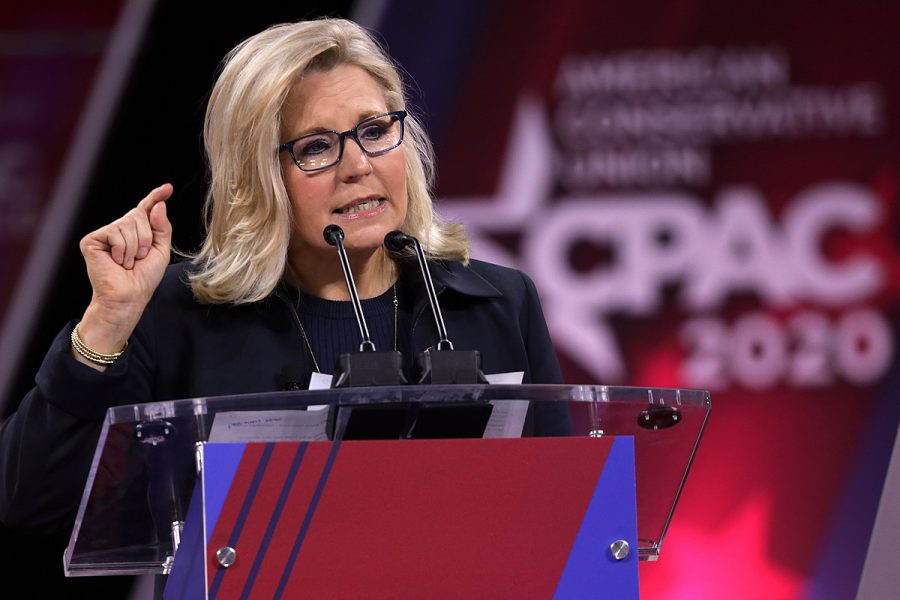 A+photograph+of+Liz+Cheney+speaking+behind+a+lectern.+In+the+background%2C+the+logo+for+the+2020+Conservative+Political+Action+Conference+is+visible.