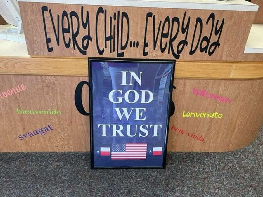 A photograph of an in god we trust sign