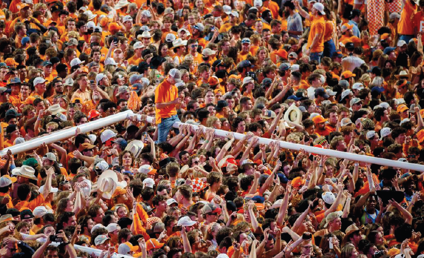 After watching their team topple the Crimson Tide, Tenenssee fans stormed the field.
Oh, and they ripped out the goalpost for a solid crowd-surf through Knoxville.