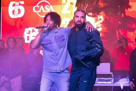 Drake (right) performs with 21 Savage (left).
