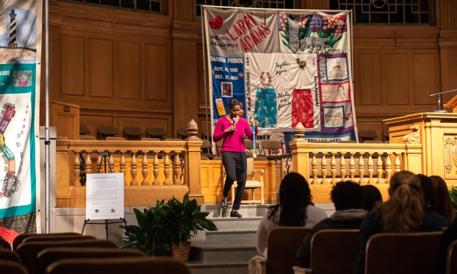 Some sections of the quilt serve as the background to Briana Scurrys MLK Day keynote.