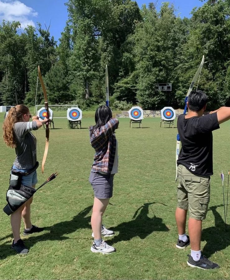 Members of the archery club practice at Waterfall Field near Reynolda Village.