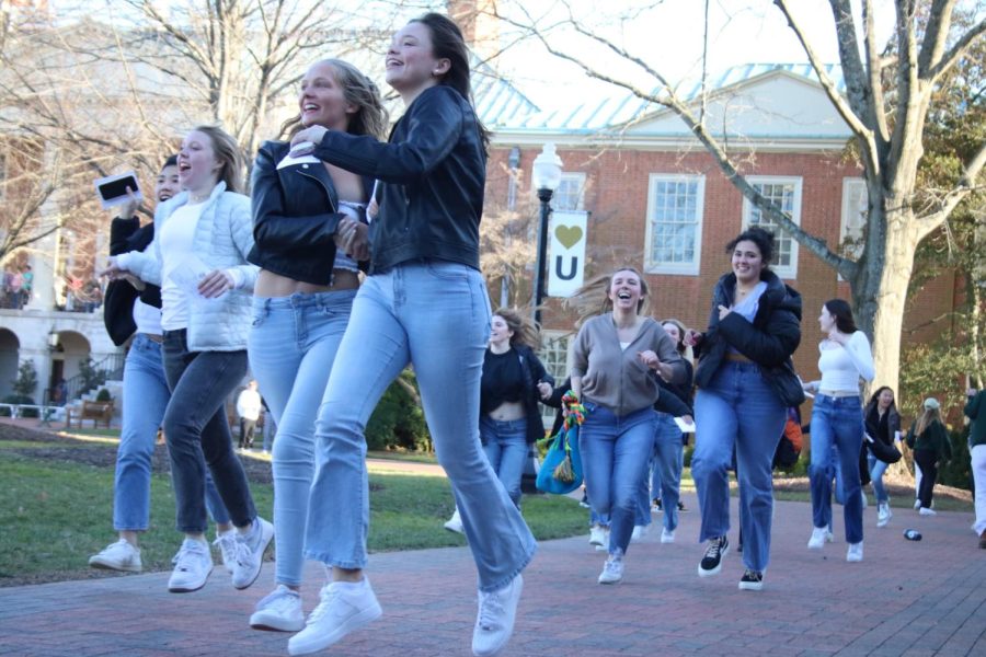 New sorority members run home to their organizations lounges on Bid Day.