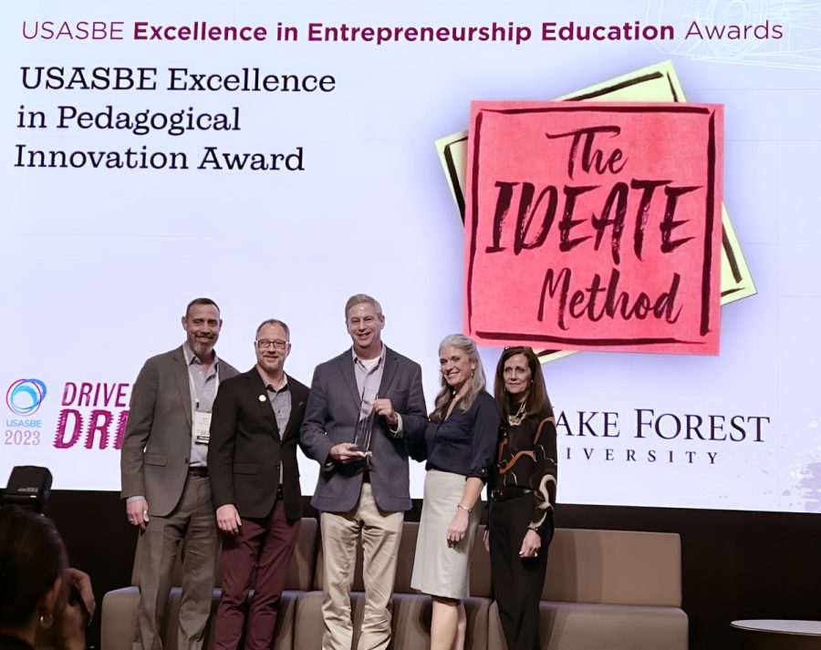Staff at the Center for Entrepreneurship pose with the award.