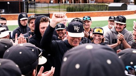 The baseball team celebrates its 18-2 victory against Mount St. Marys on Friday afternoon.