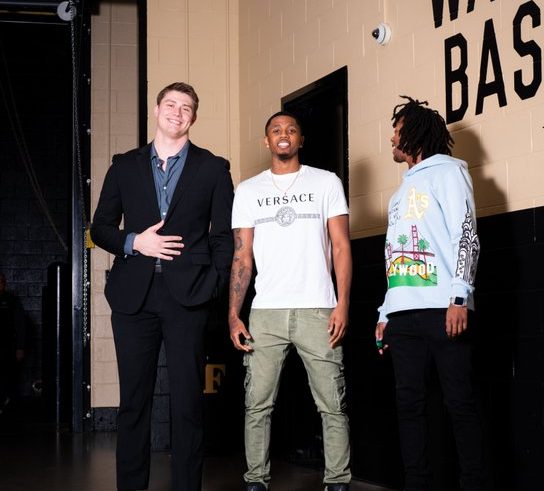 From right to left, Grant van Beveren, Daivien Williamson and Tyree Appleby pose before their final home game as Demon Deacons.