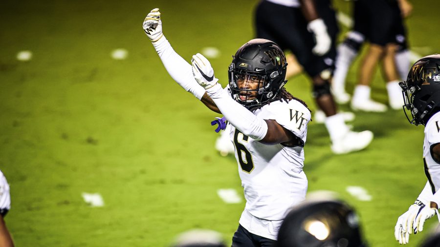 JaSir Taylor celebrates the success of a play during a loss to NC State in 2020.