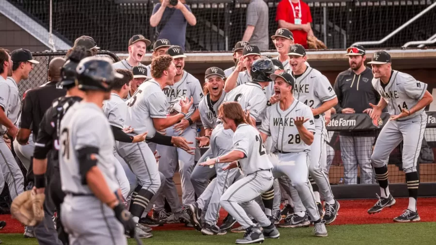Wake+Forest+celebrates+a+home+run+in+the+series+opener+against+Louisville.