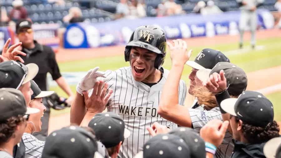 Danny Corona (front center) celebrates with his teammates.