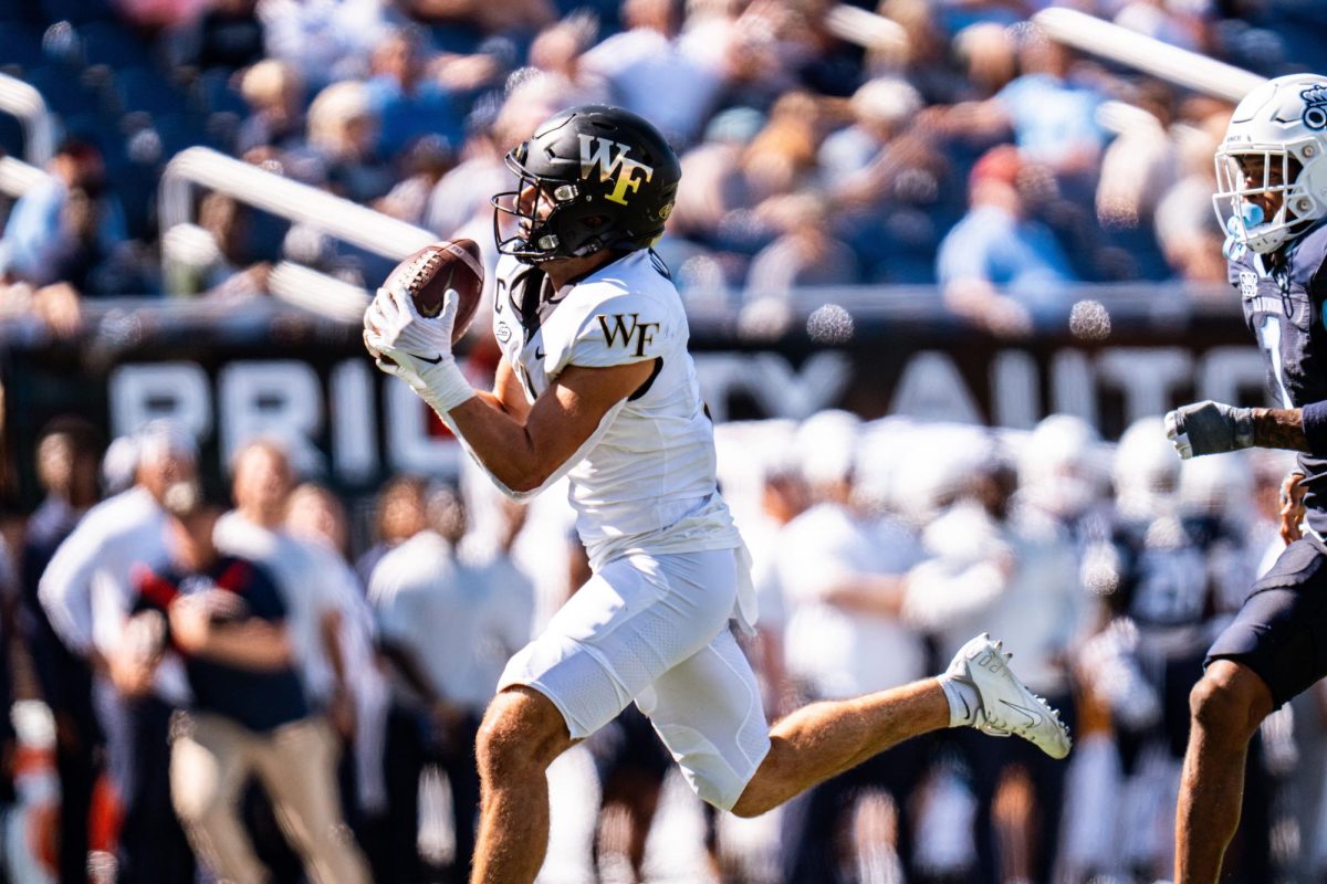 Taylor+Morin+reels+in+one+of+two+touchdowns+of+the+day.+Morin+finished+the+game+with+six+receptions+for+112+yards+and+two+scores+%28Courtesy+of+Wake+Forest+Athletics%29.
