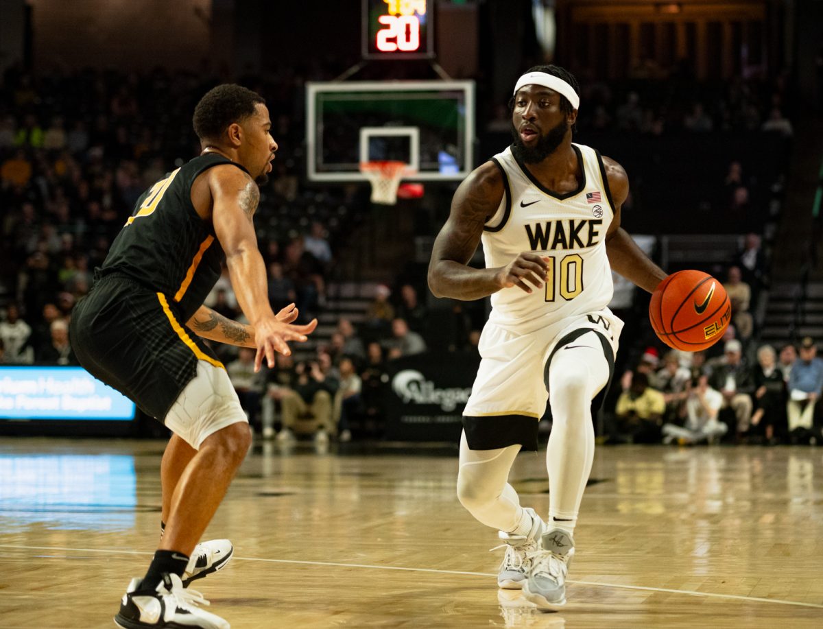 Jao Ituka takes the ball into the paint against Appalachian State on Dec. 14, 2022.