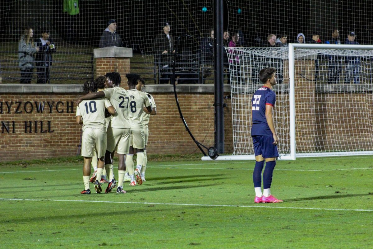 Wake Forest huddles together to celebrate a Leo Guarino goal.