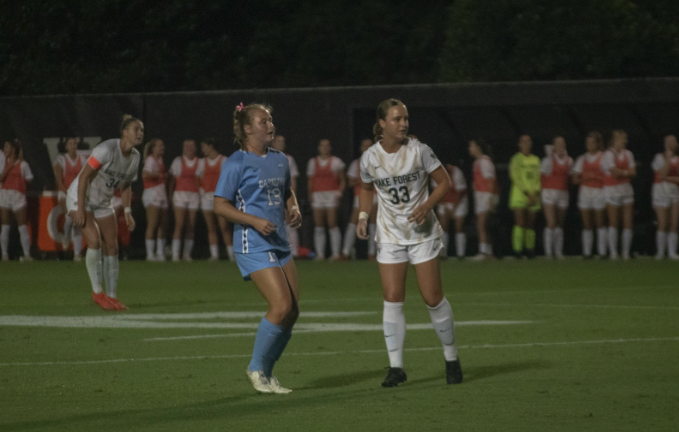 Sisters Emily, left, and Abbie Colton, right, were literally matched up against each other at the midfielder position during the Wake Forest-UNC soccer match on Oct. 13, 2023.