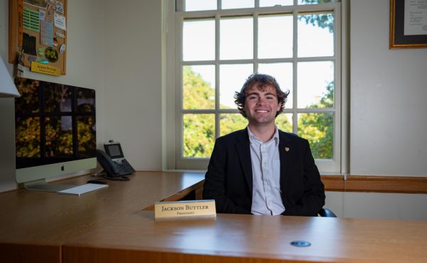 Jackson Buttler, Wake Forest Universitys current Student Body President sits in his office in Benson Student Center.